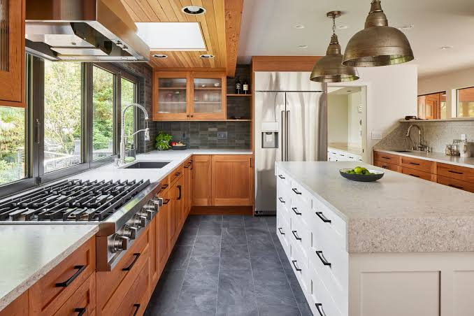 10 Hidden Factors in a General Contractor Pricing Guide to Avoid Unexpected Construction Costs 2 A fully completed high-end kitchen remodel featuring premium finishes.. Source: Model Remodel
